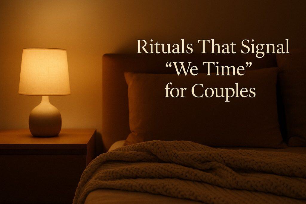A softly lit bedside lamp next to a bed with pillows and a knitted blanket, perfect for creating calming we-time rituals for couples.
